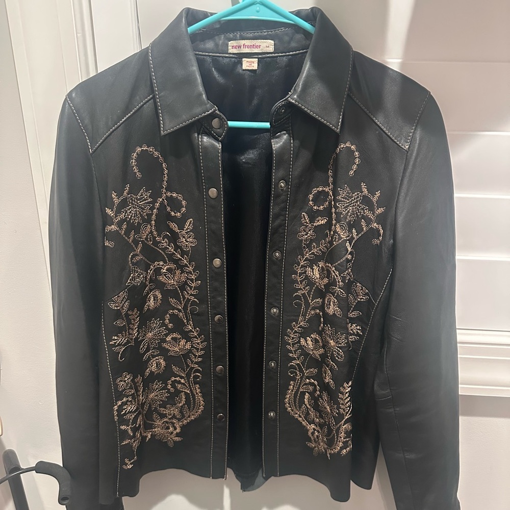 leather floral embroidered pattern jacket.